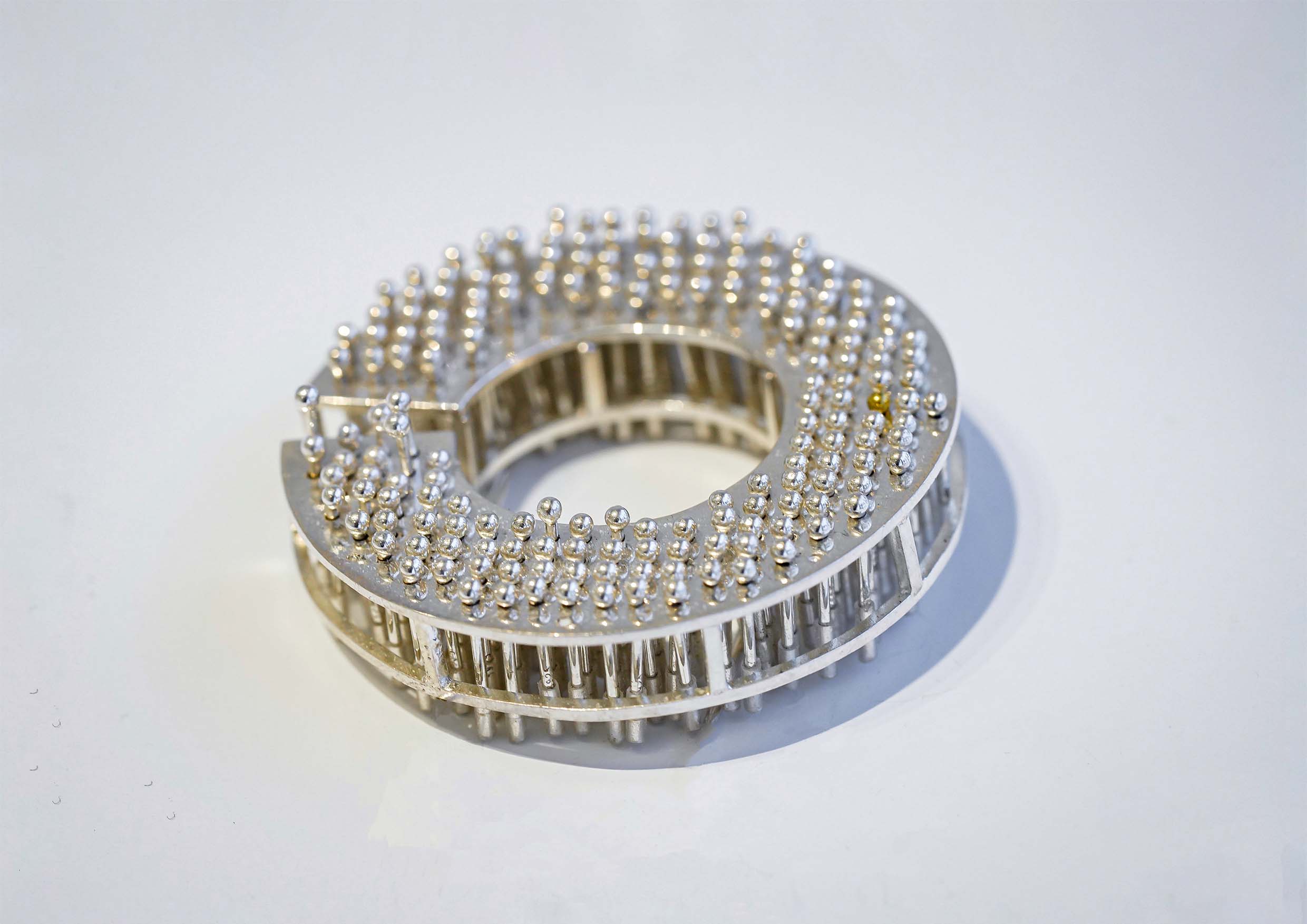 "Less Than One" Brooch Series